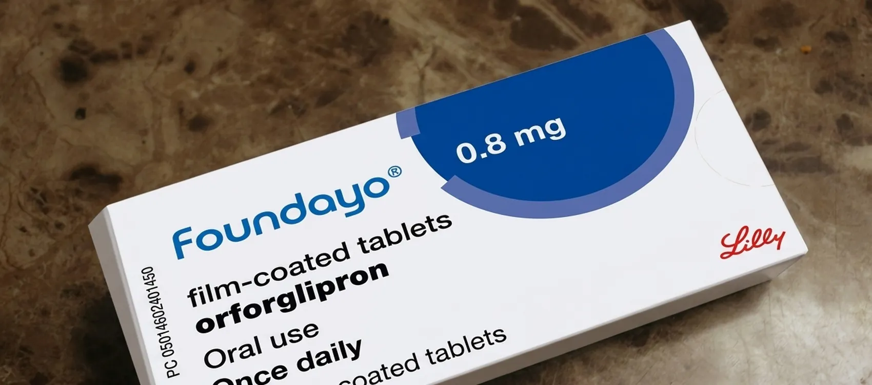 Illustration of a carton showing the brand name Foundayo above the generic name orforglipron